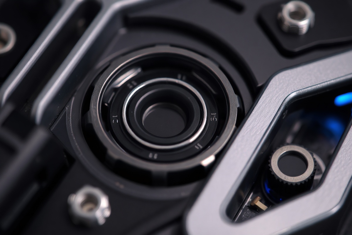 Close-up of a gaming mouse on a textured mousepad next to a monitor displaying crosshair settings